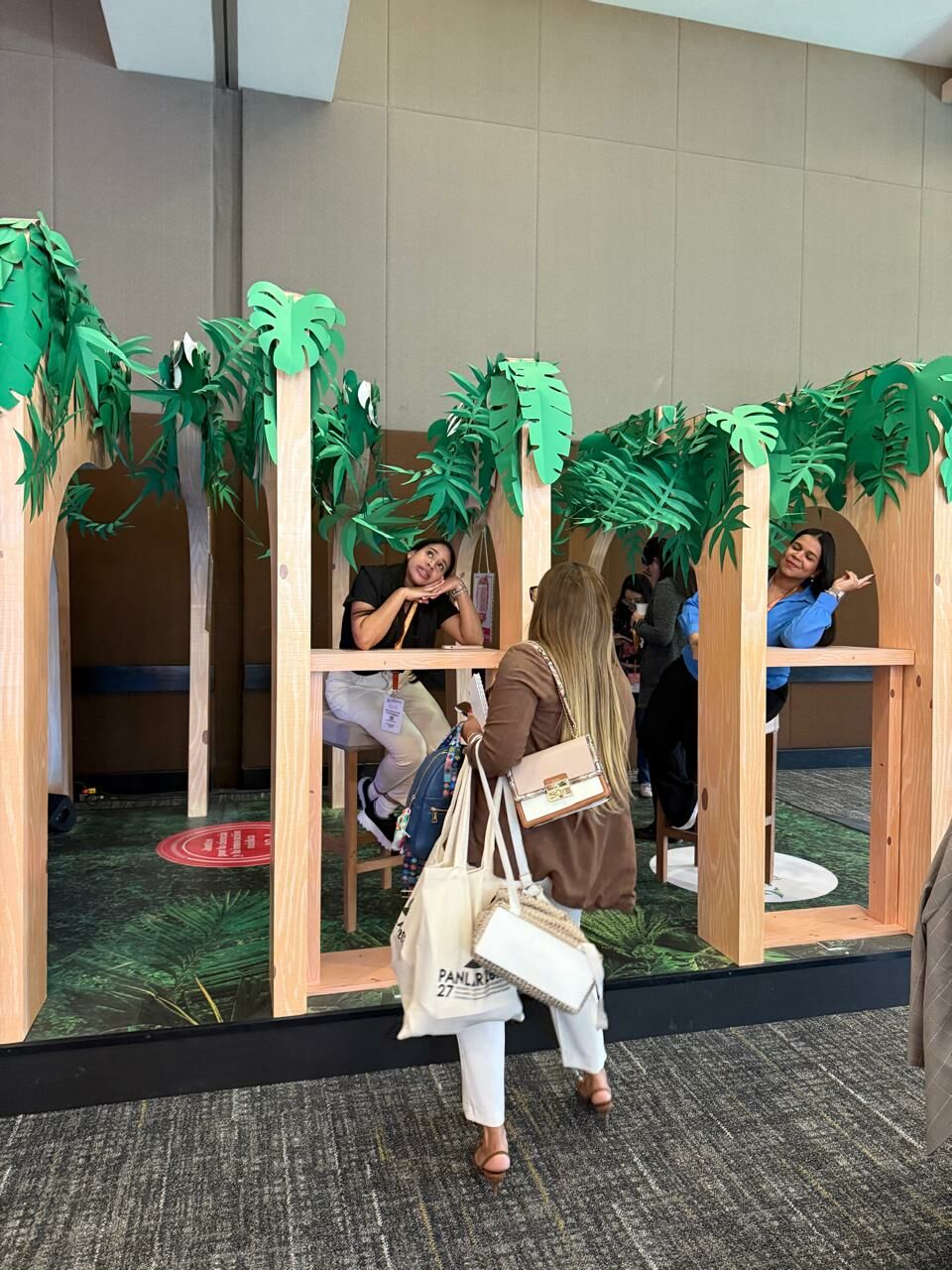 Sustainable exhibition design featuring Mexican cultural motifs and recyclable cardboard structures for PANLAR 2025