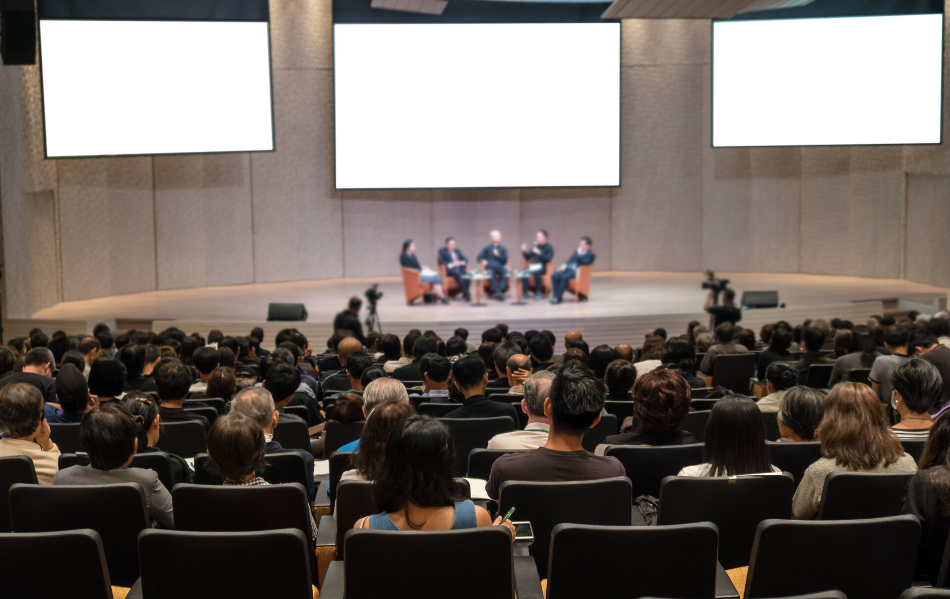 rear-view-audience-speakers-stage
